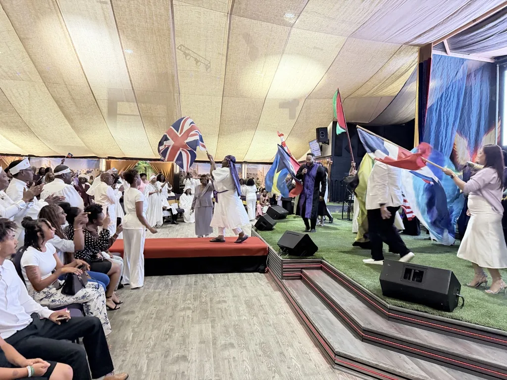 Members of the All Nations multicultural church family worshiping together